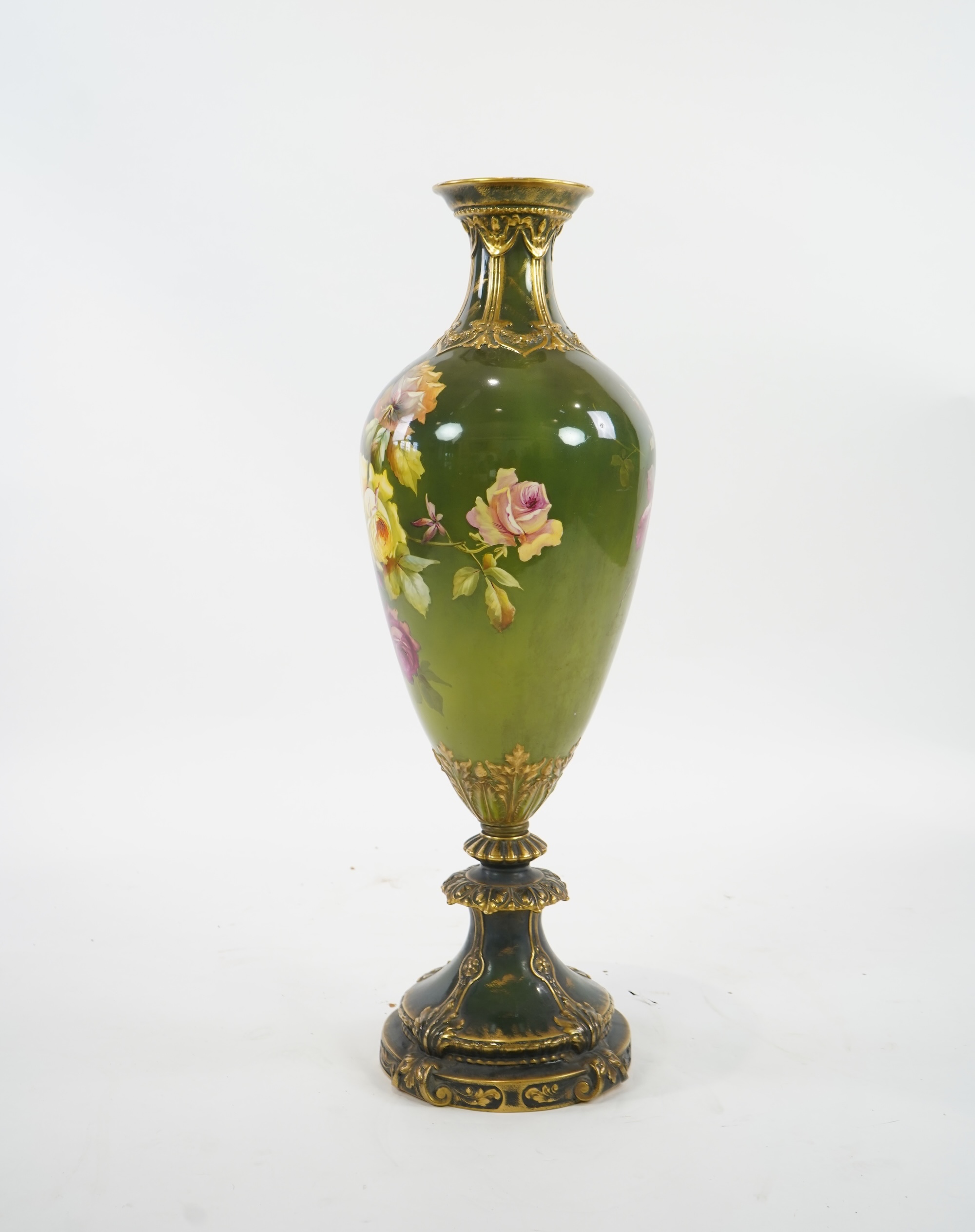 An exhibition size Continental rose painted pottery vase, late 19th/early 20th century
